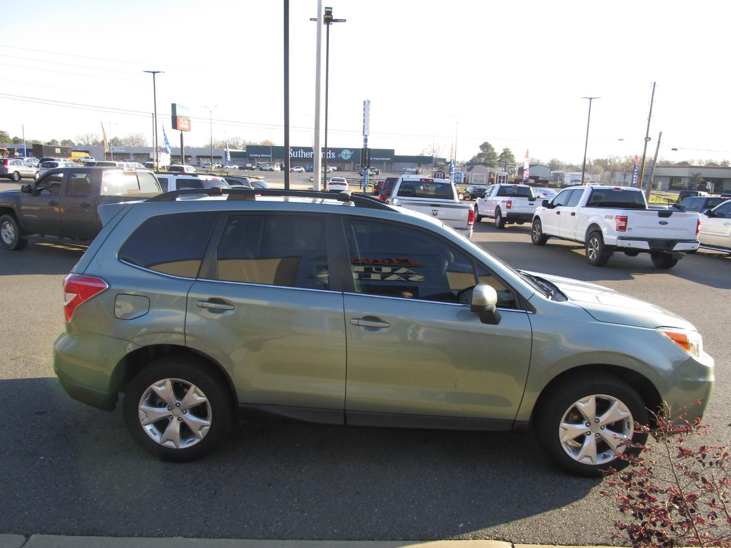 2016 Green Subaru Forester (JF2SJAKC7GH) , located at 1814 Albert Pike Road, Hot Springs, AR, 71913, (501) 623-1717, 34.494228, -93.094070 - Photo#2